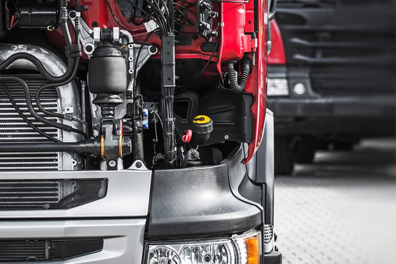 broken down truck with the hood open