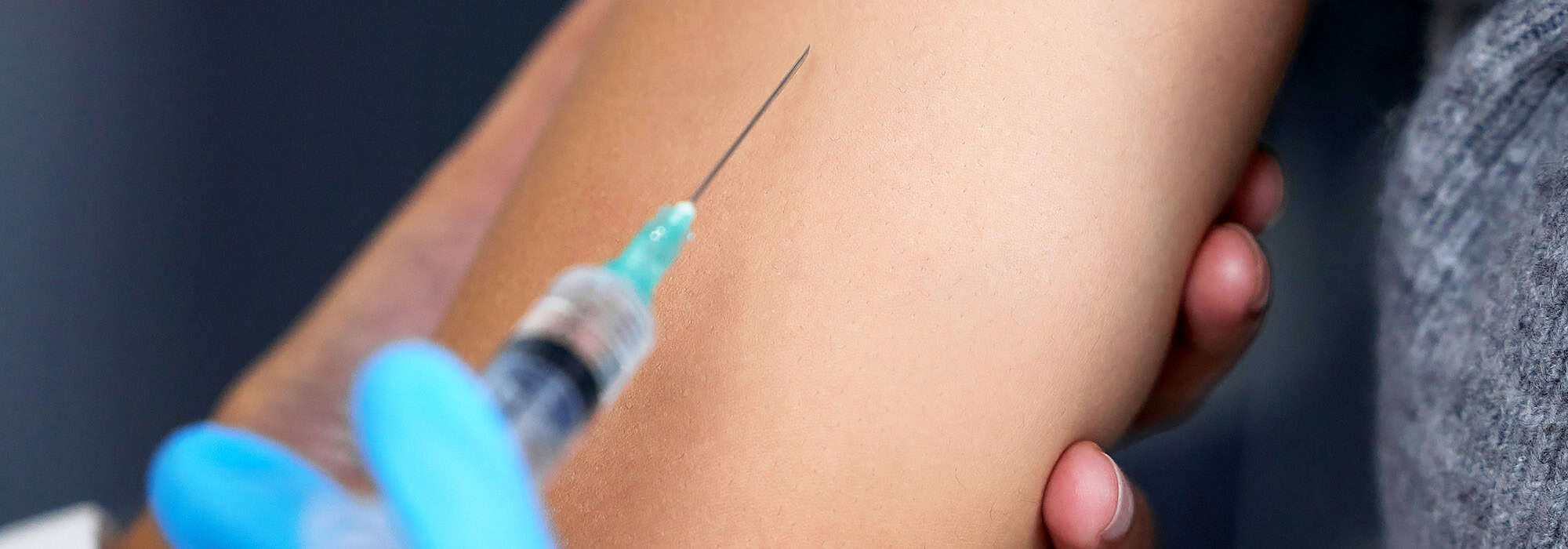 Woman receiving an injection