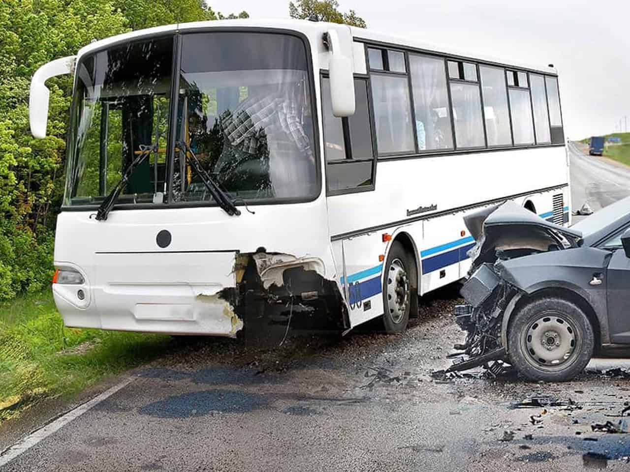 Bus and sedan accident scene