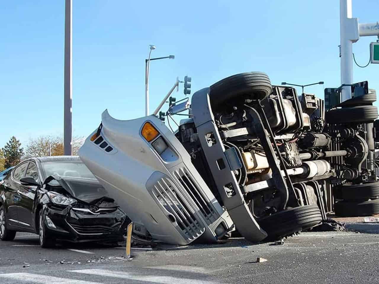 Truck accident involving big rig and sedan