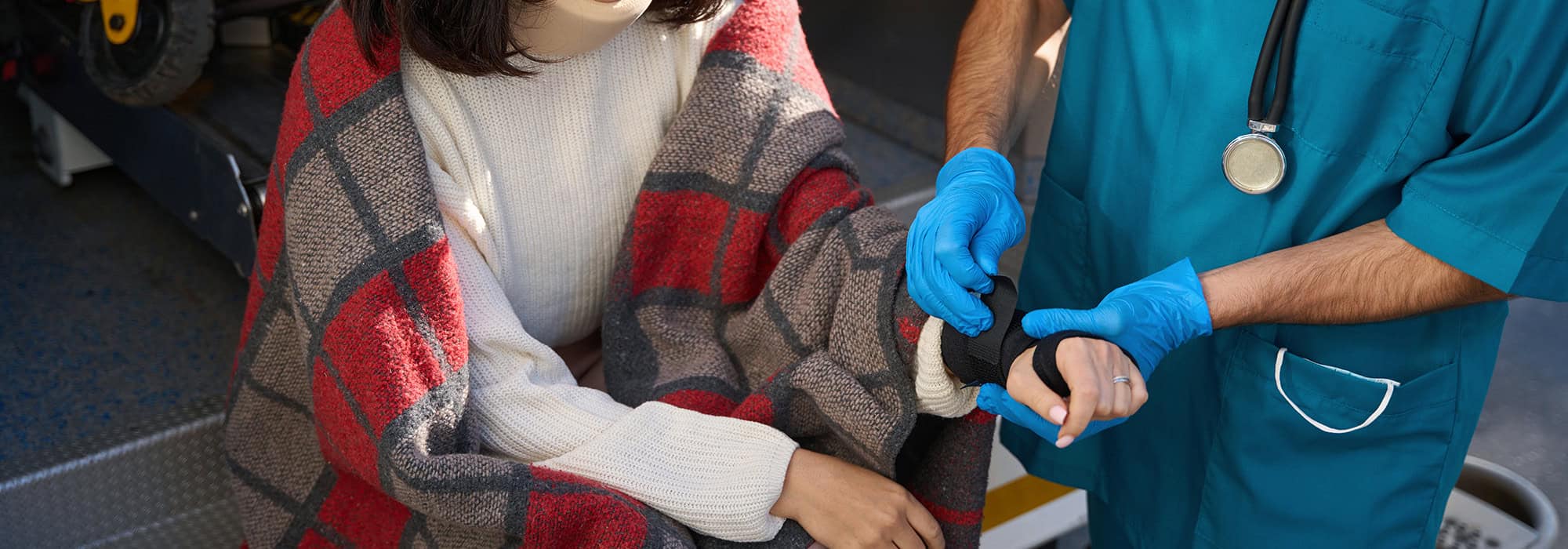 Woman getting treated for wrist injury