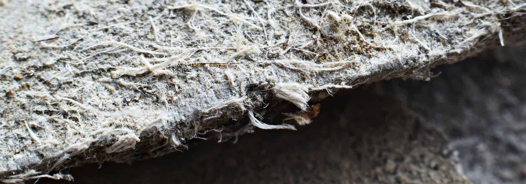 Asbestos fibers in roofing material