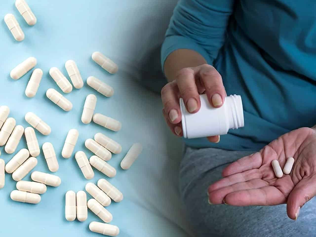 Closeup of woman taking medication