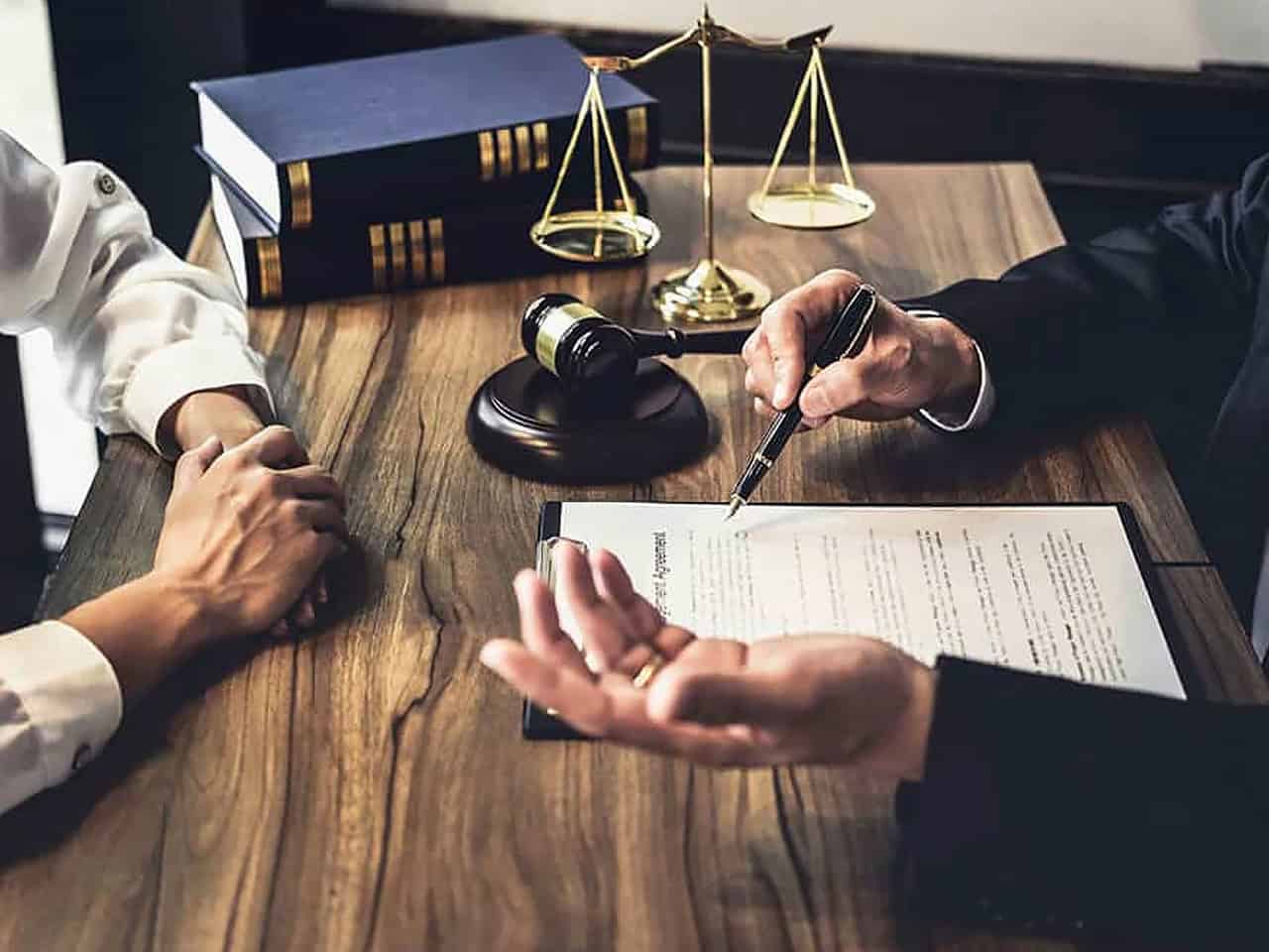Lawyer and client going over agreement