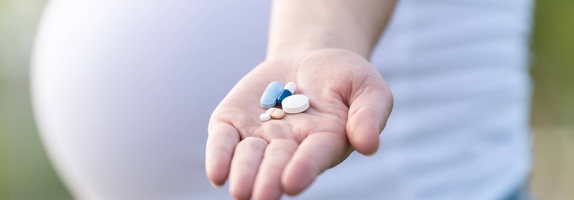 Pregnant woman with medicine