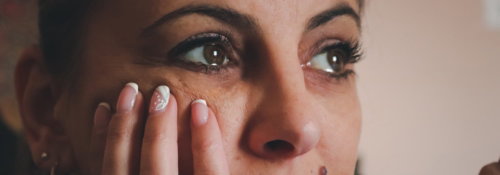Sad eyes of middle aged woman