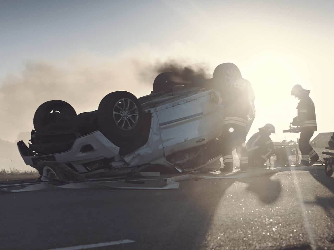 Overturned vehicle with first responders