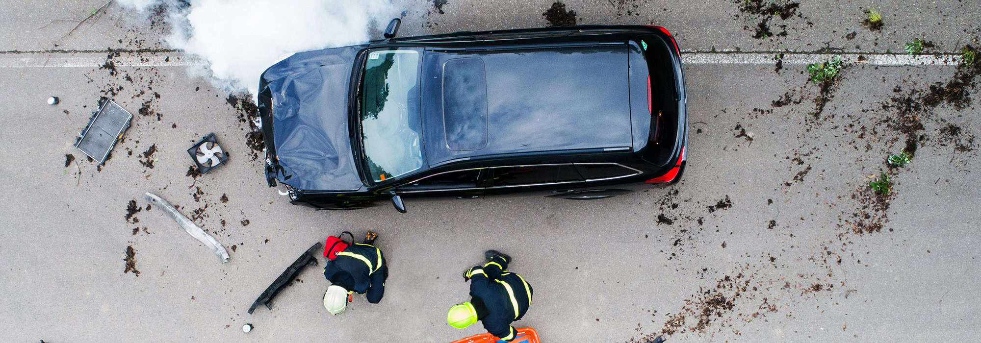 Vehicle accident scene with first responder